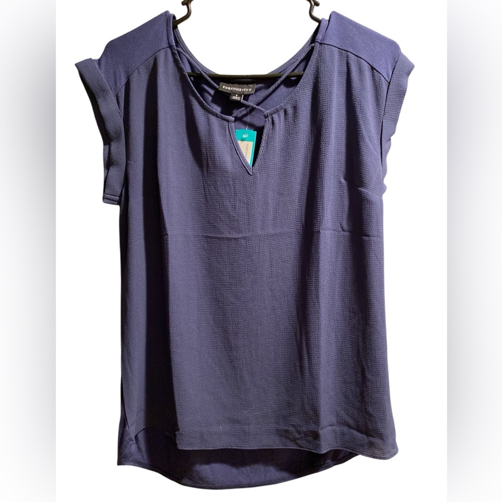 Fortune + Ivy Blue Blouse with a crisscross V opening in front.